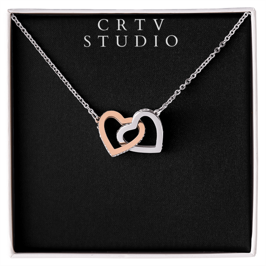 Interlocking Hearts Necklace - Yellow & White Gold Variants